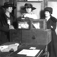 Photo 'Three suffragists casting votes in New York City(?).'