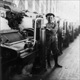 Boy sweeper working in a cotton mill in Evansville, Indiana