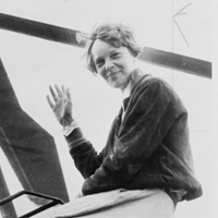 Amelia Earhart waves atop an autogiro in Los Angeles in 1932