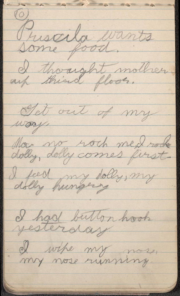Page from a child's notebook with writing