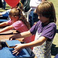 Photo of children at tables