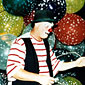 Photo of clown with balloons