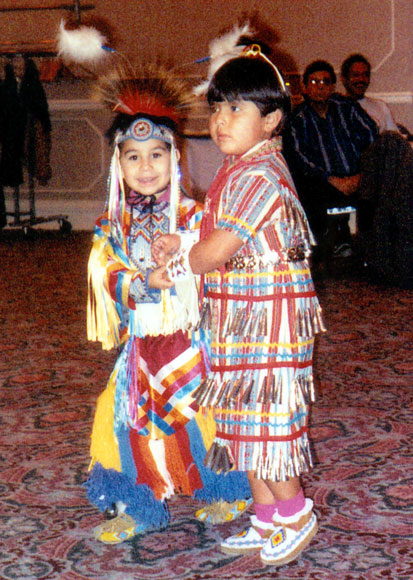 Photo of two children dancing