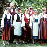 Photo of FinnConn folk dancers standing in costume, 1992