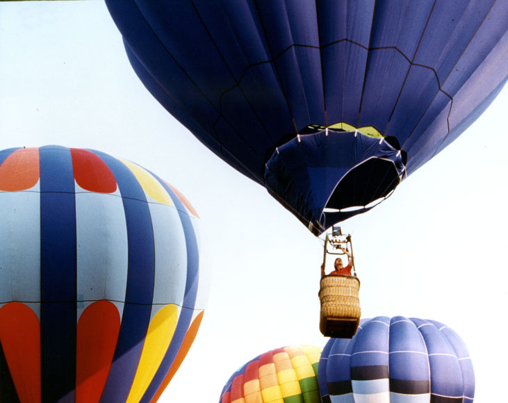 Photo of hot-air balloons in the air