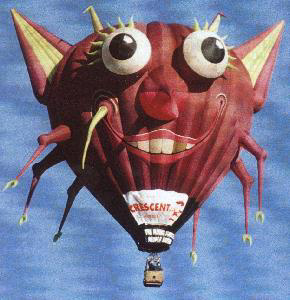 Photo of a giant hot-air balloon with face, limbs, and ears