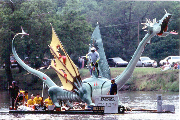 Photo of a raft decorated like a dinosaur
