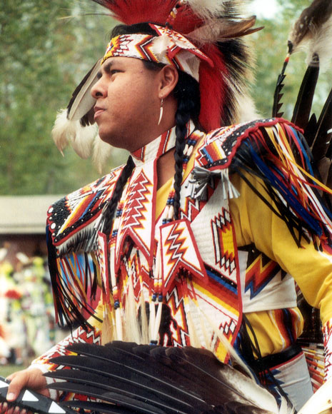 Photo of a Comanche preparing for dance competition