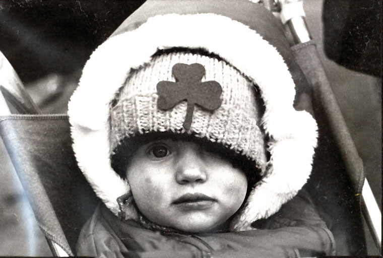 Photo of a child at St. Patrick's Day parade