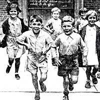 Photo of children running toward the camera