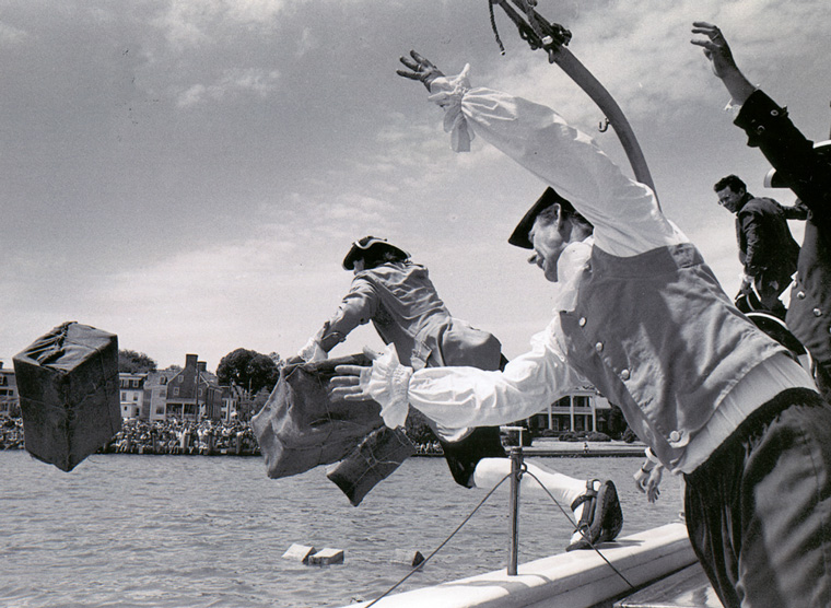 Photo of men in period clothing being thrown overboard