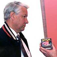 Photo of two men with a can of Spam