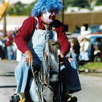Photo of 'Smilin' Joe' on a mechanical horse