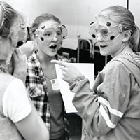 Photo of four girls in laboratory goggles