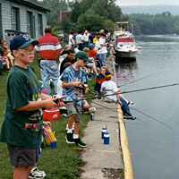 Photo of kids and families fishing