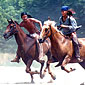 Photo of two Shawnee warriors riding horseback