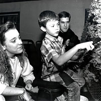 Photo of boy decorating a float