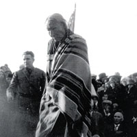 Photo of an Indian representing Chief Magpie at a burial ceremony at Washita