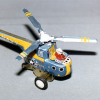 Photo of a blue and yellow toy helicopter