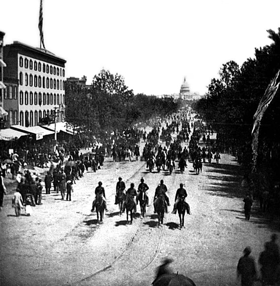 Artillery unit passing on Pennsylvania Avenue near the Treasury, 1865