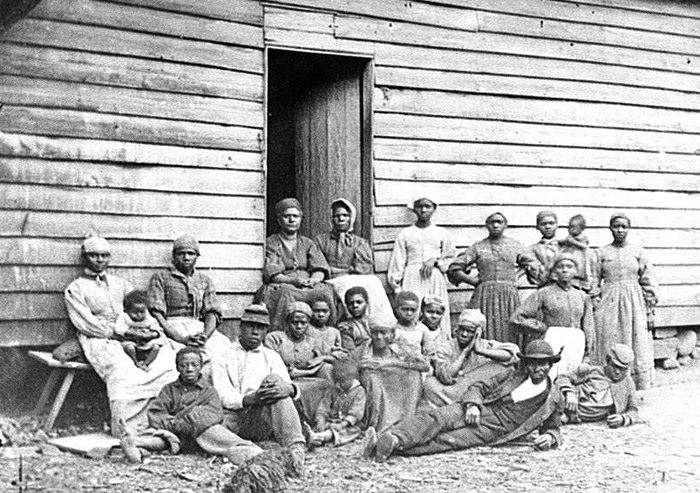 Group of 'contrabands' at Foller's house, Cumberland Landing, Va., 1862.