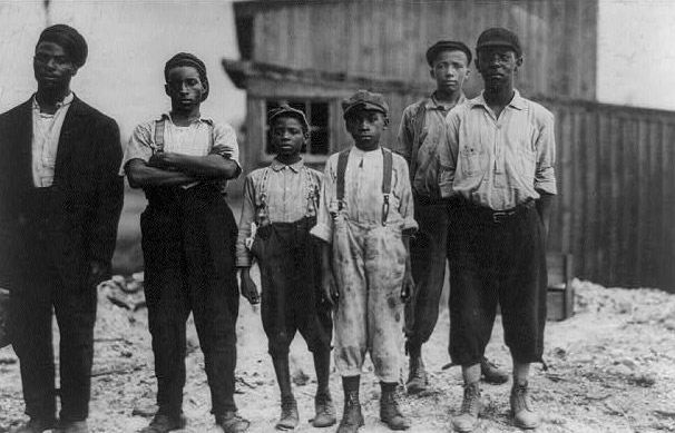 Six black workers in the Alexandria (Va.) Glass Factory, 1911