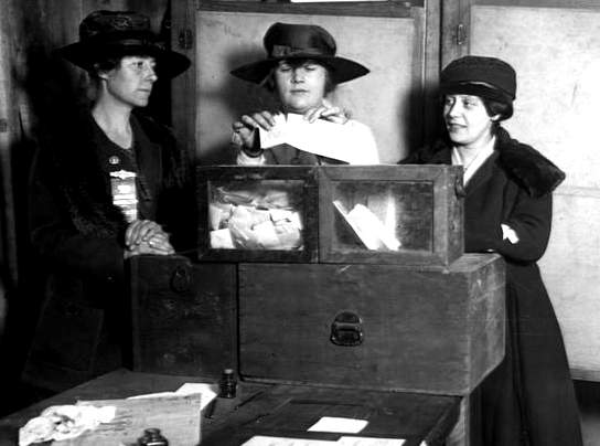 Photo of women casting votes