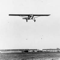 Charles Lindbergh's airplane in flight, c1927