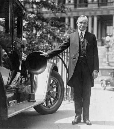 Calvin Coolidge with radio equipment used on automobiles during the campaign