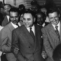 Bunche arriving at Los Angeles for convention where he received Spingarn Medal.
