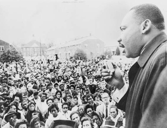 The Rev. Dr. Martin Luther King addresses gathering of followers after their aborted march yesterday in Selma, Ala.