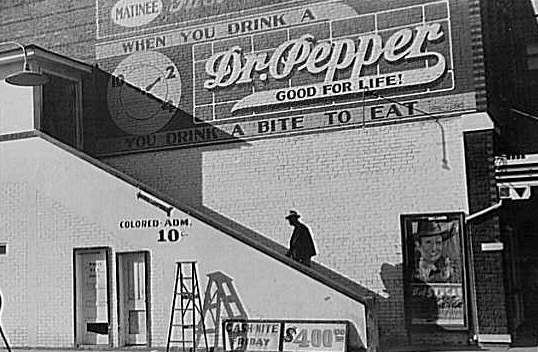 'Negro Going in Colored Entrance of Movie House, Belzoni, Mississippi Delta, Mississippi,' October 1939.