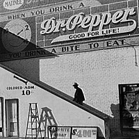 'Negro Going in Colored Entrance of Movie House, Belzoni, Mississippi Delta, Mississippi,' October 1939.
