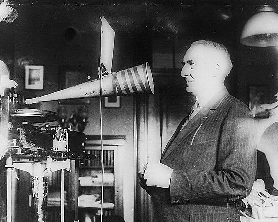 President Harding Speaking into Phonograph, 1922.