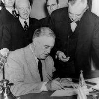 President Roosevelt Signing the Declaration of War Against Japan, 1941.
