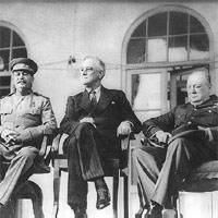 Roosevelt, Stalin, and Churchill on portico of Russian Embassy in Teheran, during conference.