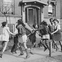 Children playing 'ring around a rosie' in Chicago, 1941.