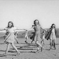 Children playing a singing game, West Virginia, 1941.