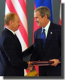 resident Vladimir Putin, left and President George W. Bush