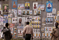 Free choice is essential in elections. Here, voters in the Democratic Republic of Congo peruse choices in 2006.