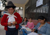 Citizens vote on laws and issues as well as candidates for office. This 2007 photo shows an Ecuadorian woman voting on constitutional reform.