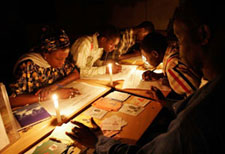Election workers count votes by candlelight in Dakar, Senegal.
