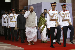 Some democracies combine elements of presidential and parliamentary systems: above, Indian President Pratibha Patil arrives at swearing-in ceremony, 2007.