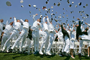 U.S. military cadets throw their hats in the air upon graduation. A professional military needs to be as well educated as its civilian overlords.