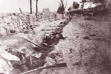 Confederate dead along a stone wall during the Chancellorsville campaign, May 1863.