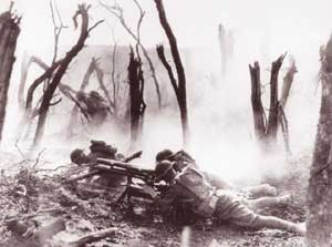 American infantry forces in 1918, firing a 37 mm. gun, advance against German positions in World War I.