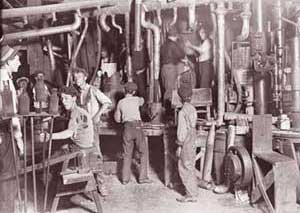 Children working at the Indiana Glass Works in 1908.