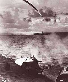A Japanese plane plunges down in flames during an attack on a U.S. carrier fleet in the Mariana Islands, June 1944.