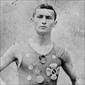 Ehrich Weiss wearing track team medals, 1890.