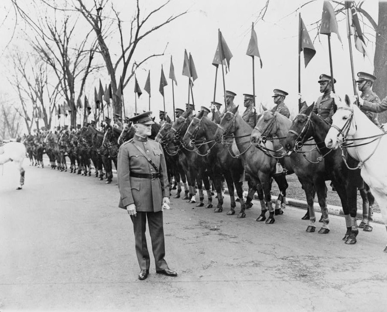 Pershing reviews cavalry troops